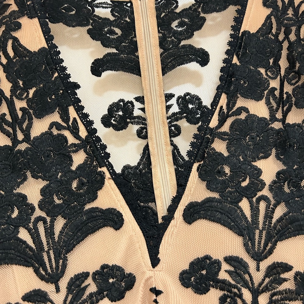Cream color with black flowers